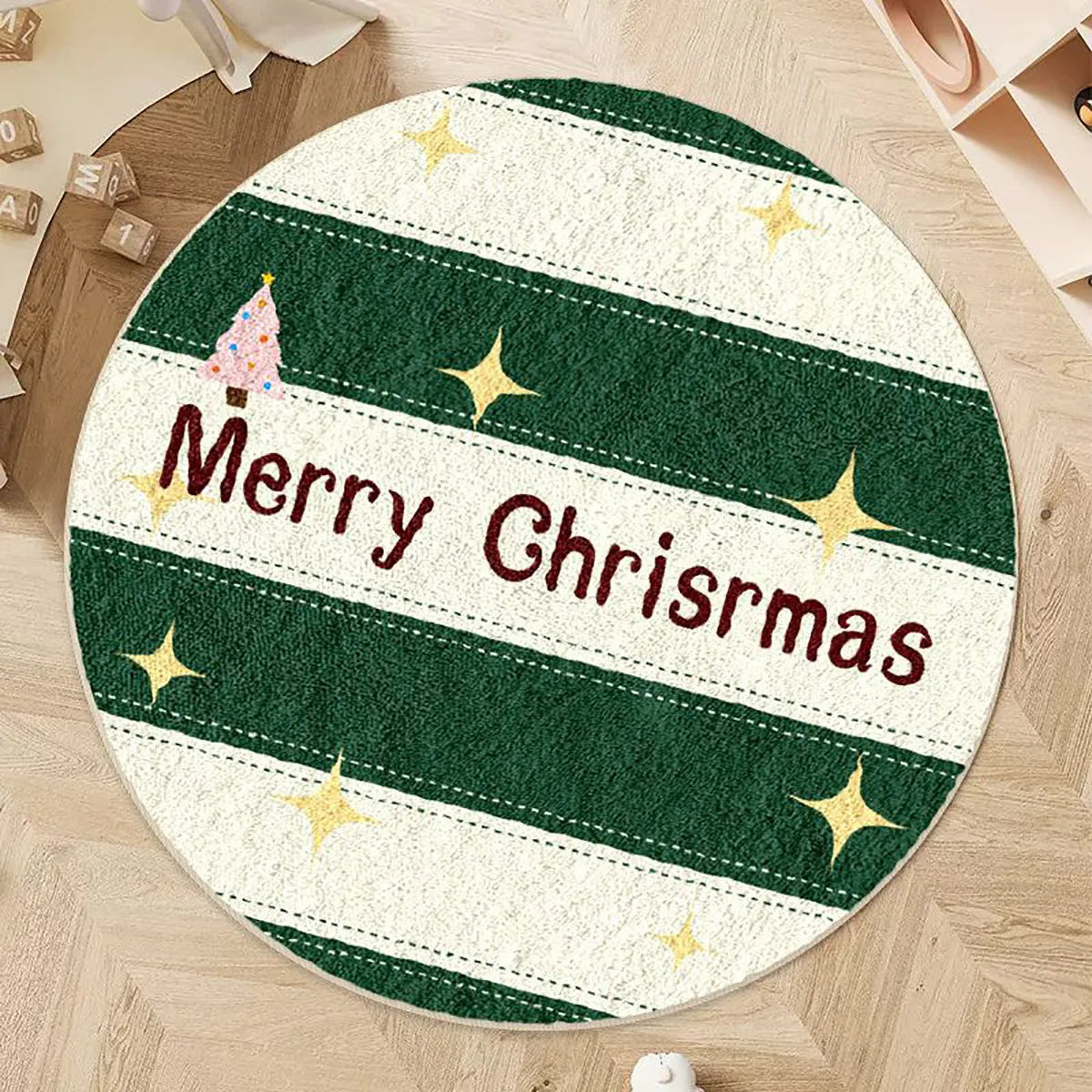 Round alien-shaped Christmas floor mat with festive patterns in imitation cashmere fabric.