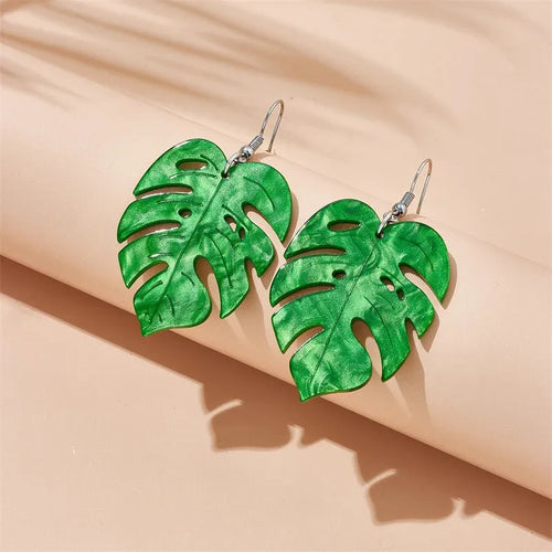 Acrylic drop-shaped earrings with coconut leaf pattern in one of five colours on an alloy hook.