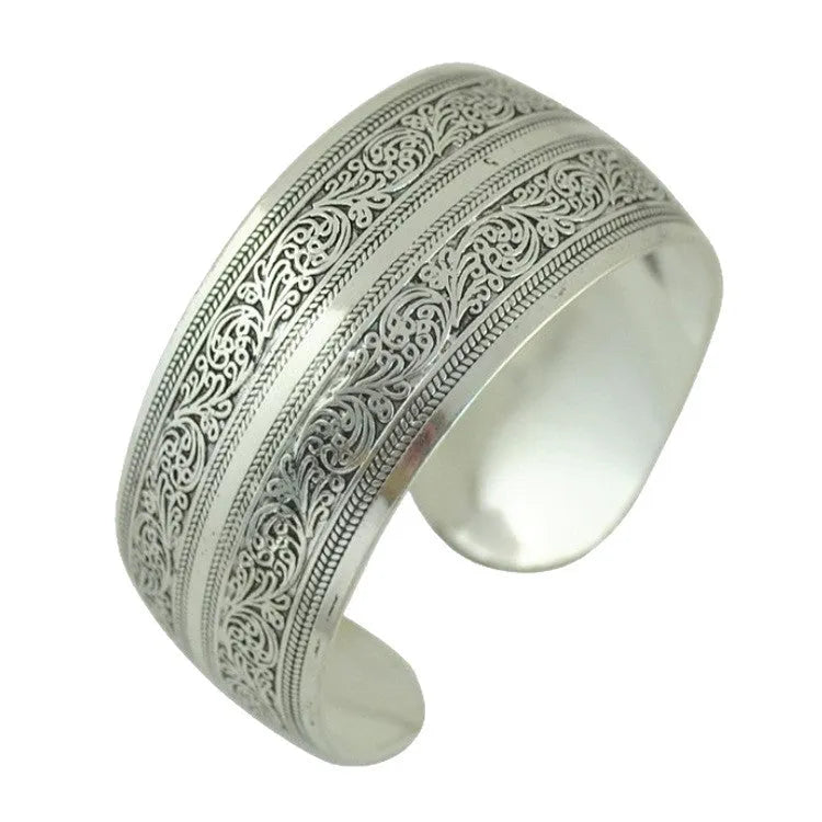 Open carved Miao silver bracelet with ethnic design and Roman shape in alloy