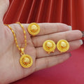 Gold-plated three-piece jewellery set with necklace, earrings, and ring featuring floral design patterns