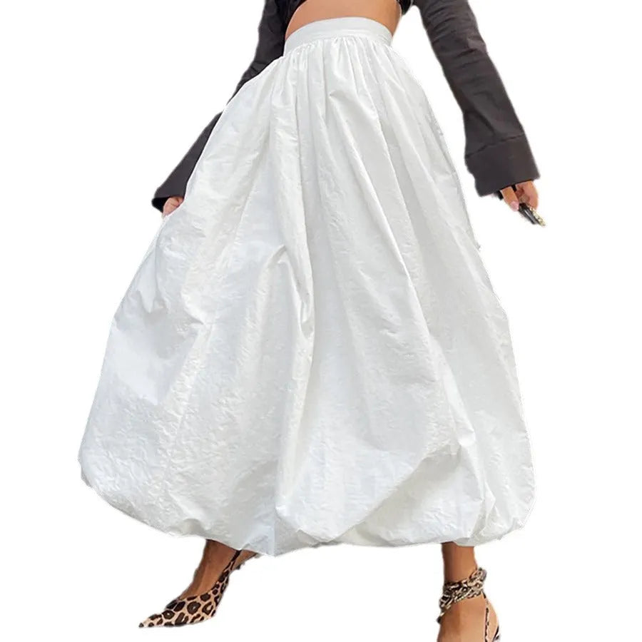 Women's solid colour cotton long skirt shown in black and white options