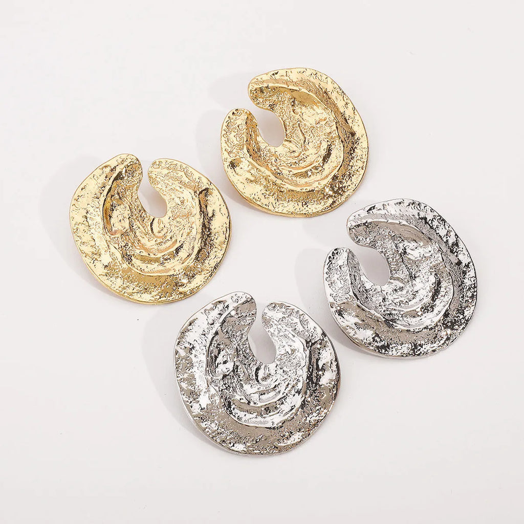 Geometric alloy women's earrings with exaggerated irregular pleated design and concave-convex texture in gold colour