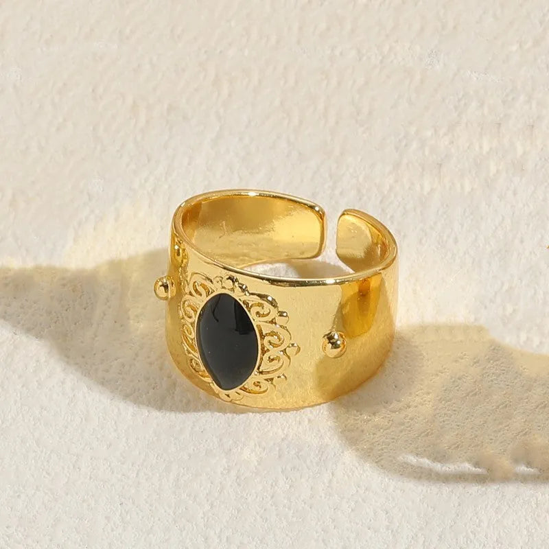 Geometric Chinese style vintage copper ring with electroplated horse eye black finish and zircon detailing