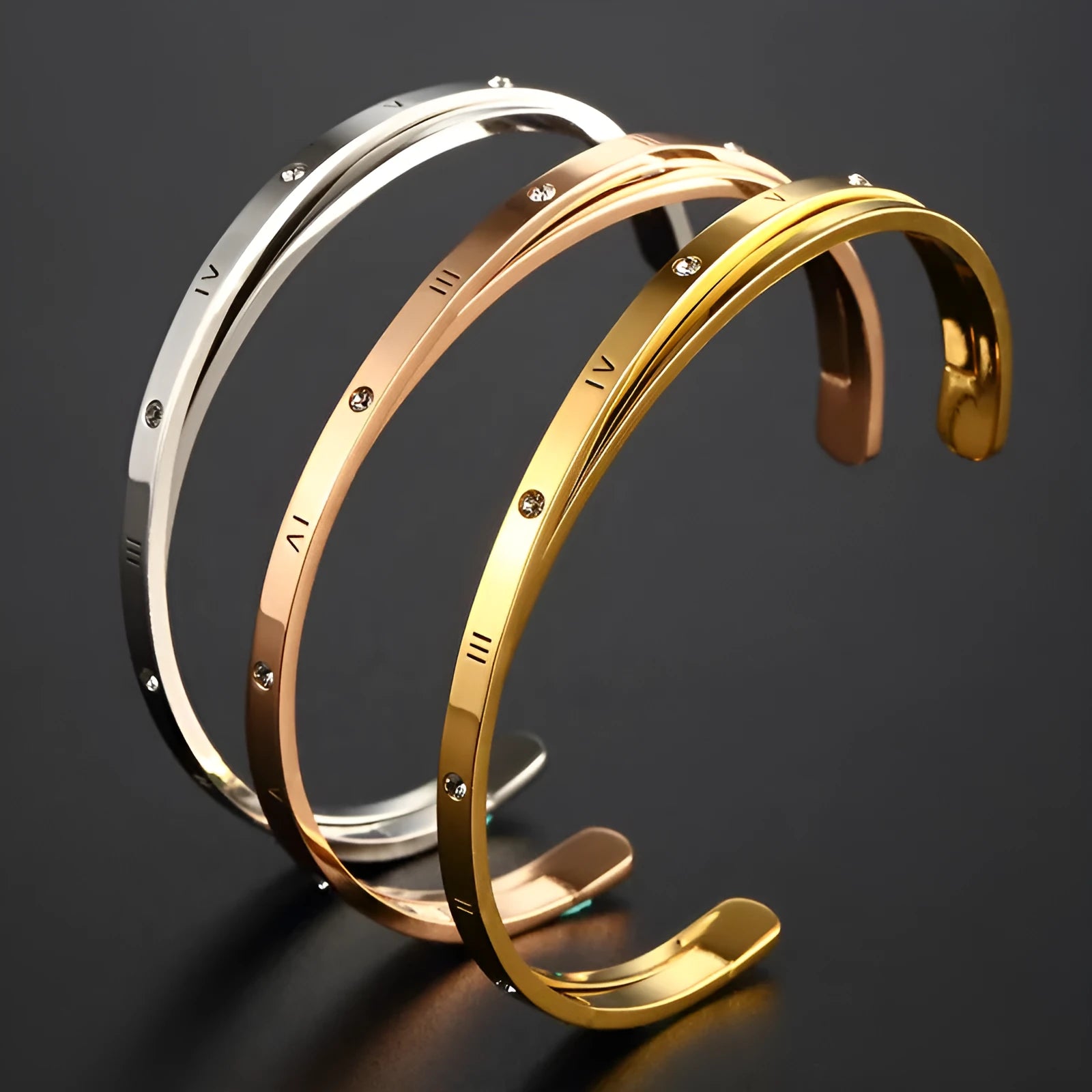 Open-ended stainless steel bracelet with inlaid zircon stones in rose, steel or gold electroplated finish