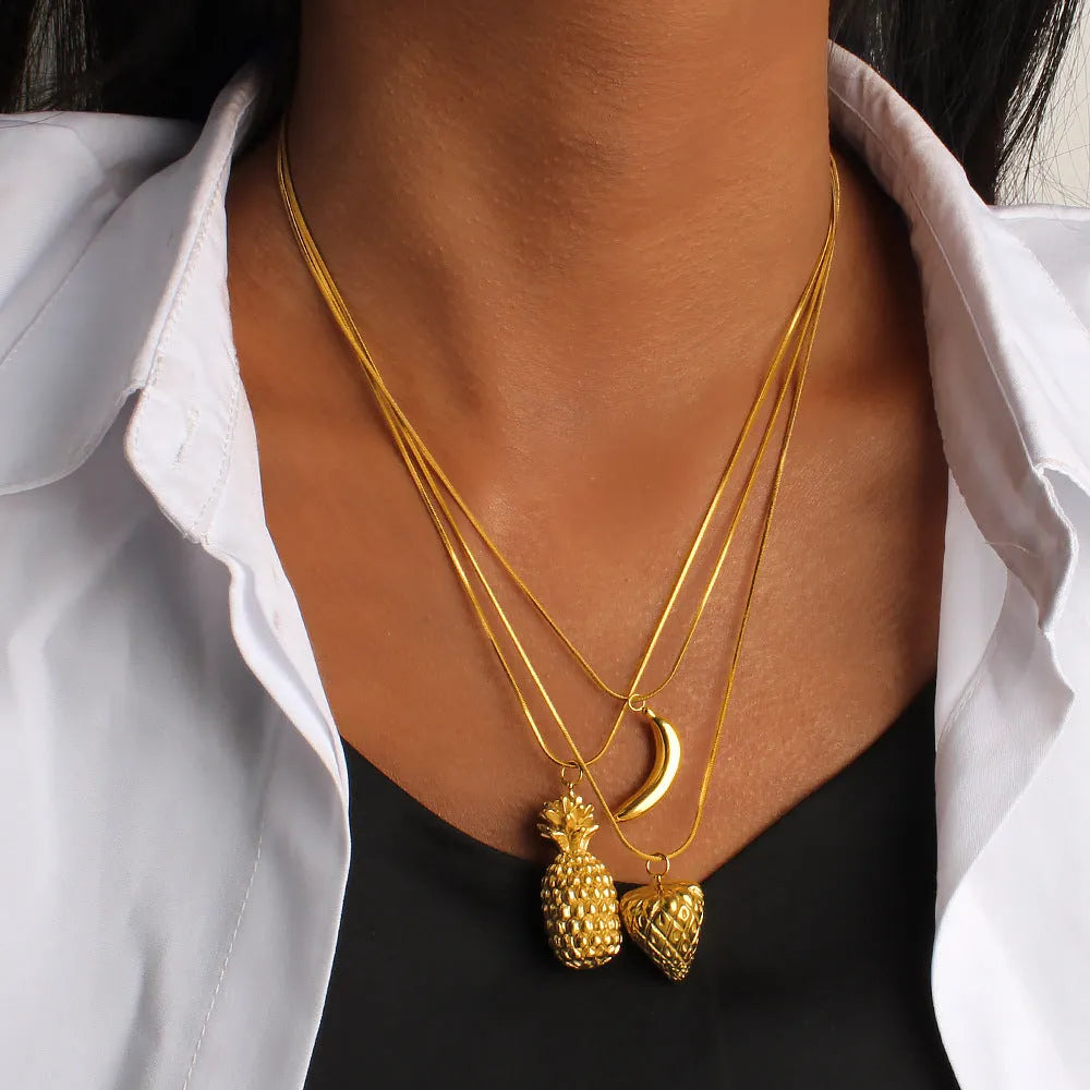 Stainless steel necklace with a detailed fruit-shaped pendant, options include apple, grape, and watermelon.