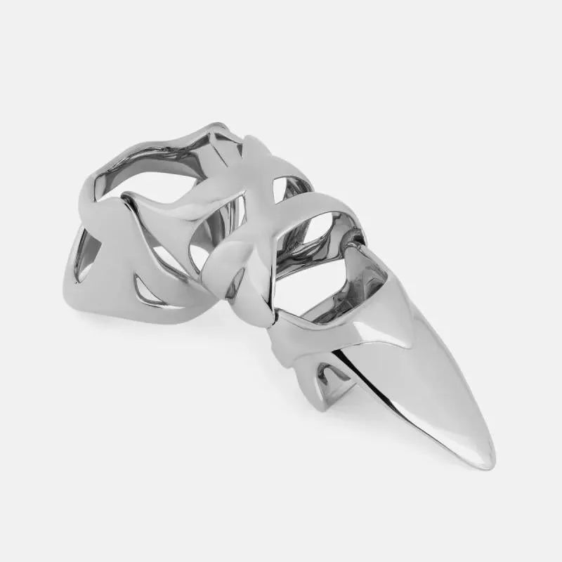 Silver-coloured alloy punk armour finger stall ring on a black background.