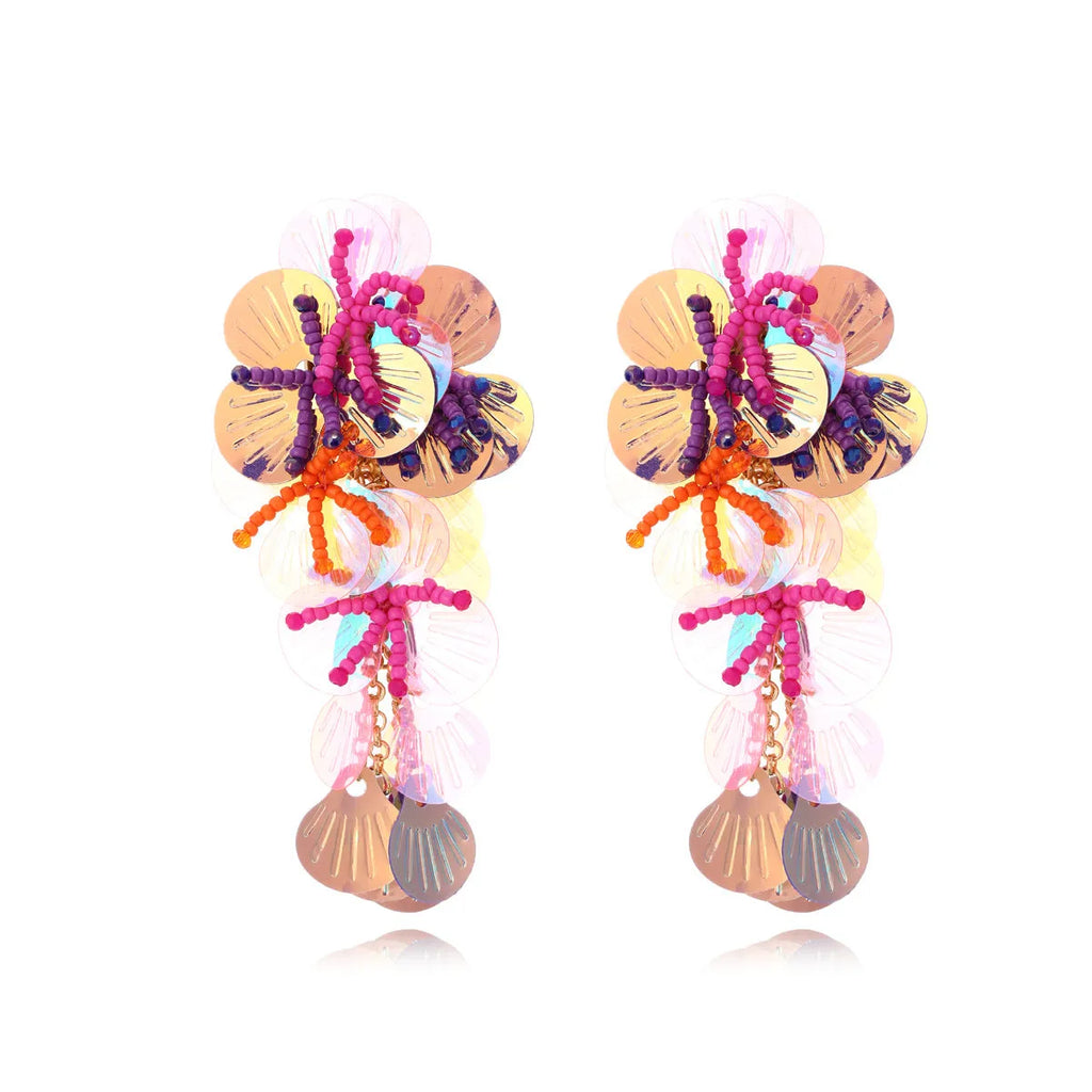 Handmade floral earrings with colourful beads on strings in exaggerated dopamine style European American design
