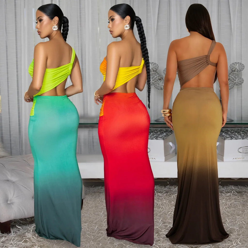 Women's sleeveless cross-shoulder dress in a gradient colour with a high waist and long skirt.