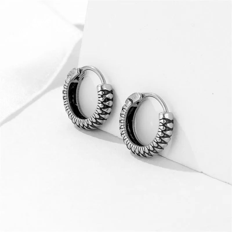 Geometric round stainless steel earrings with retro striped pattern in silver colour