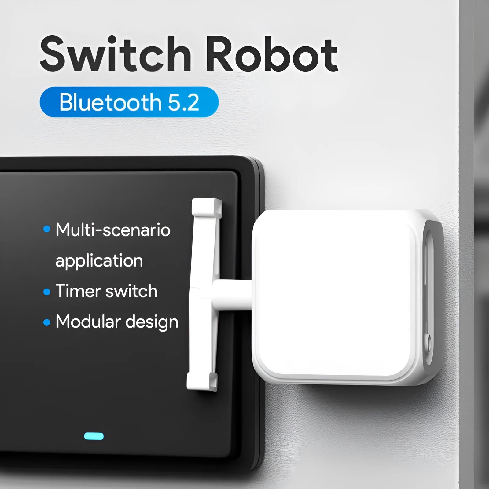 Small white Bluetooth rocker arm finger robot remote control on a grey surface.