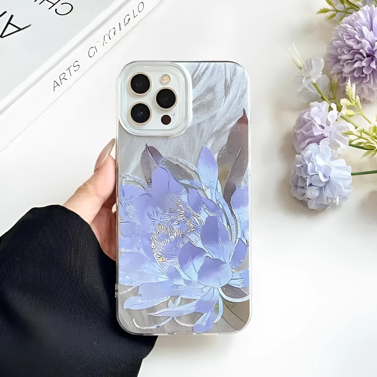 Blue Lotus design hard PC phone case for iPhone with included silicone component, shown in one of four colour variants.