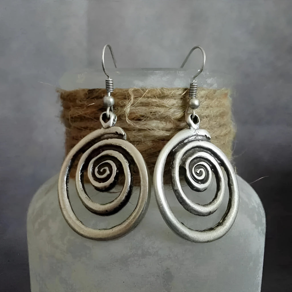 Silver geometric spiral distressed alloy earrings with national style design measuring 2.6 cm wide by 5 cm long