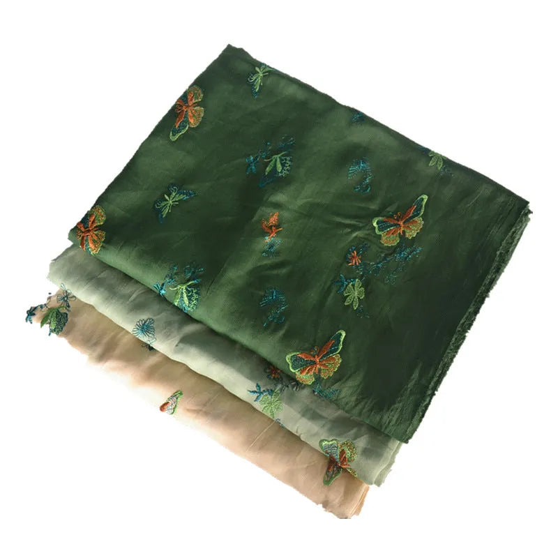 Pure ramie fabric in beige, grass green, and dark green colours, shown with a 1 metre length.