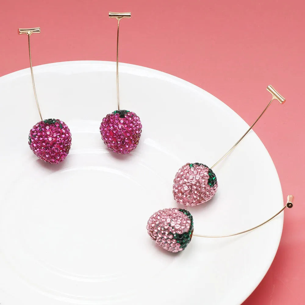 Geometric zinc alloy strawberry earrings for women in red with spot drill detail.