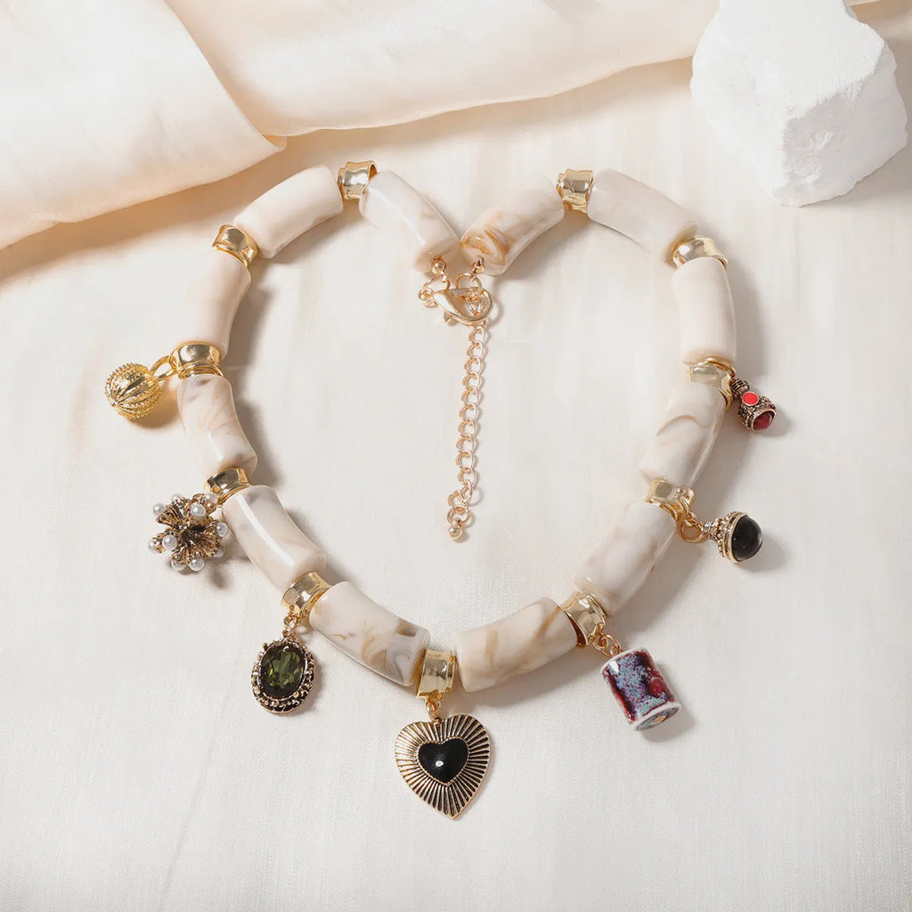 Heart shaped bamboo design resin necklace for women with electroplated picture colour finish