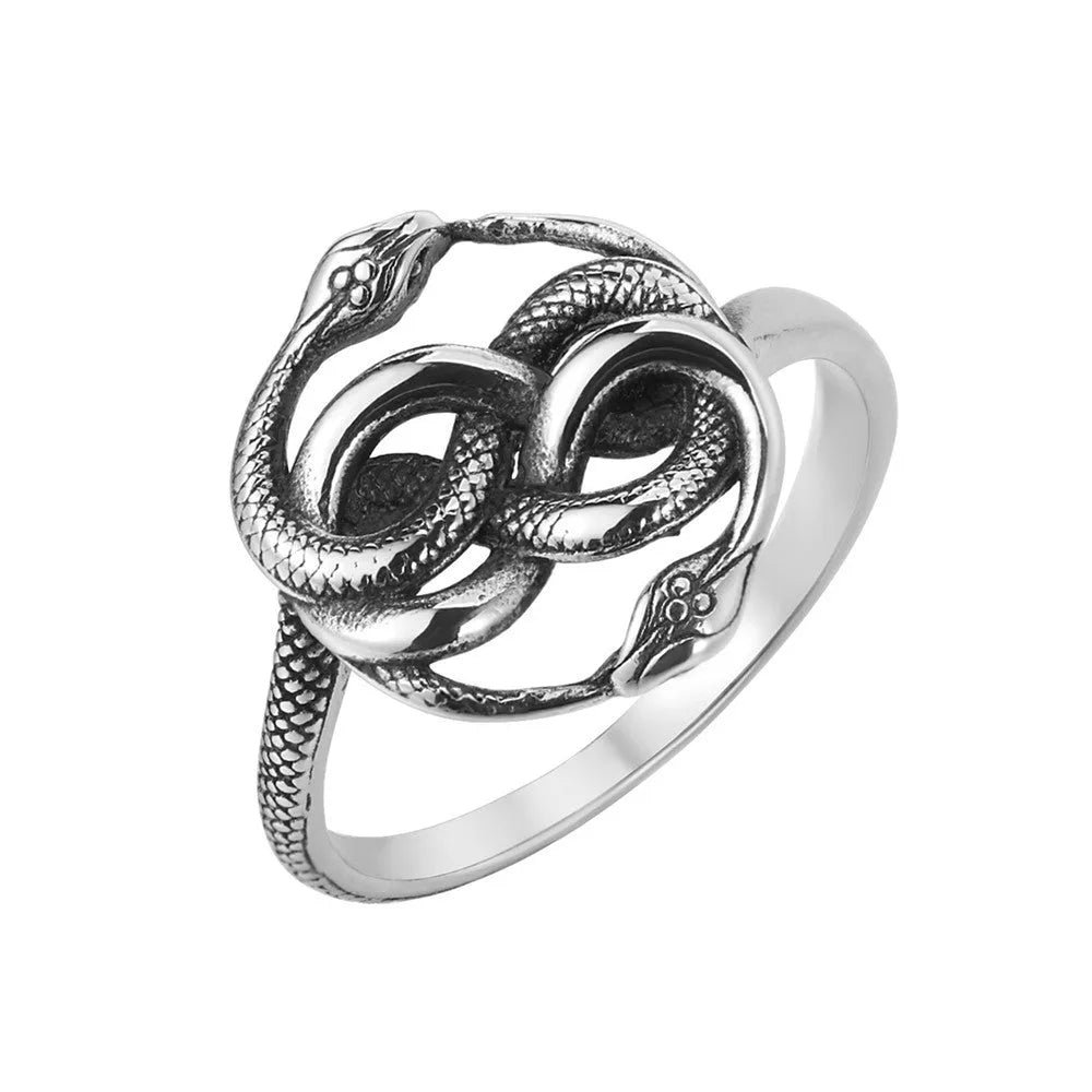 Detailed view of a titanium steel retro double snake ring in steel colour on a finger