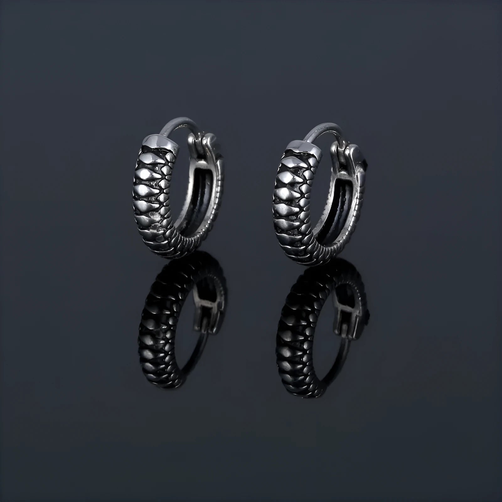 Geometric round stainless steel earrings with retro striped pattern in silver colour