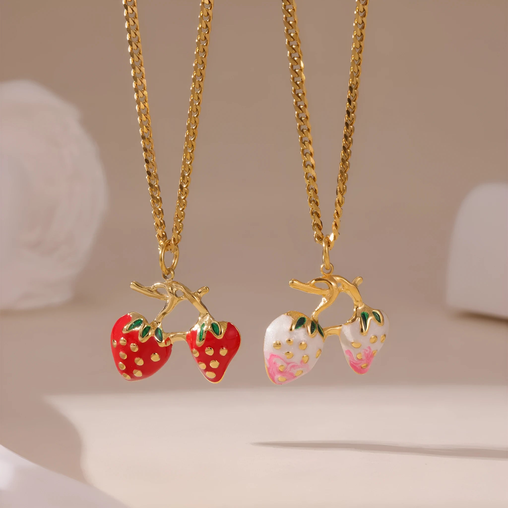 Women's summer strawberry fruit pendant necklace in red or white gradient on a steel chain.