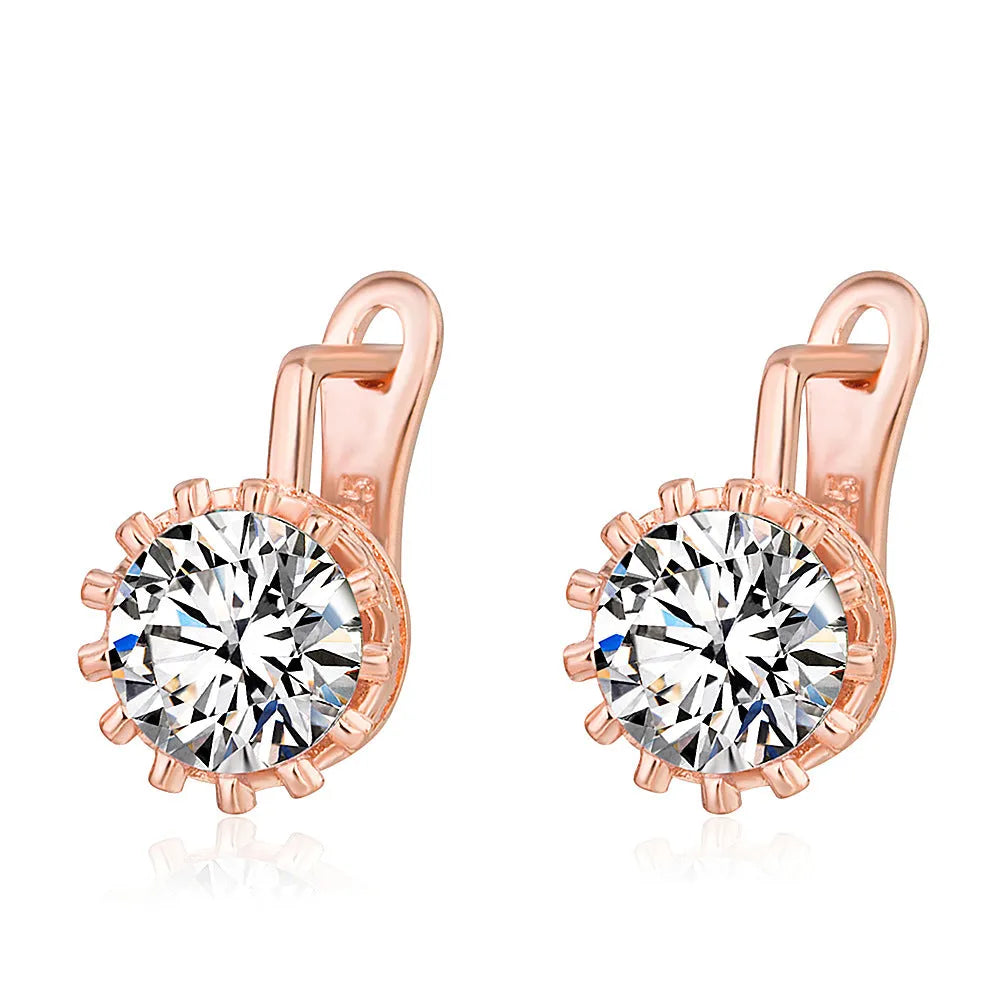Crown-shaped clip-on earrings with white diamond details in rose gold or white gold colour finish