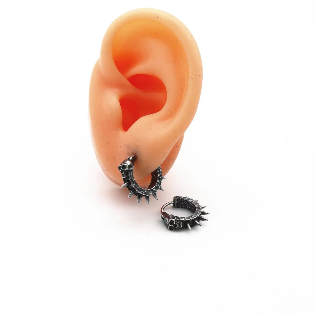 Geometric alloy earrings with motorcycle punk theme in copper and black colours