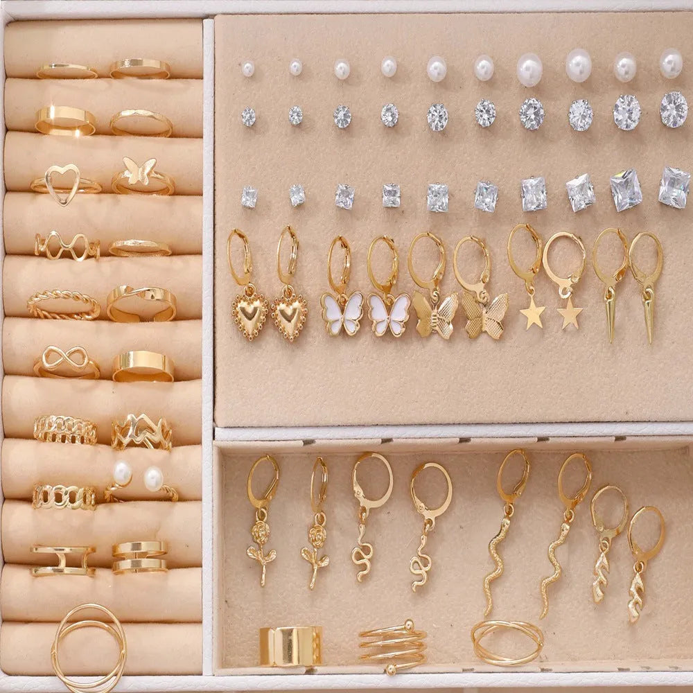 108 geometric alloy earrings with gold and yellow electroplated finishes and round pearl elements