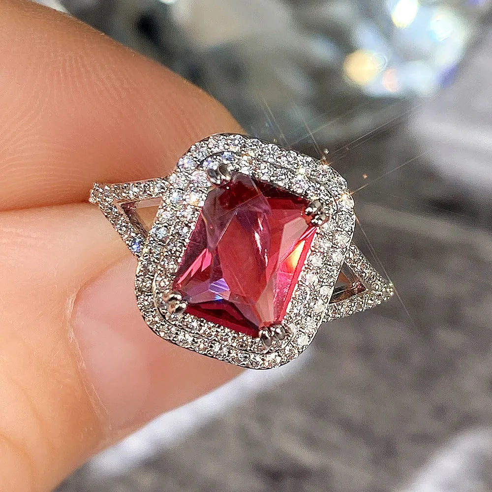 Copper square geometric women's ring with a central rhinestone in red colour
