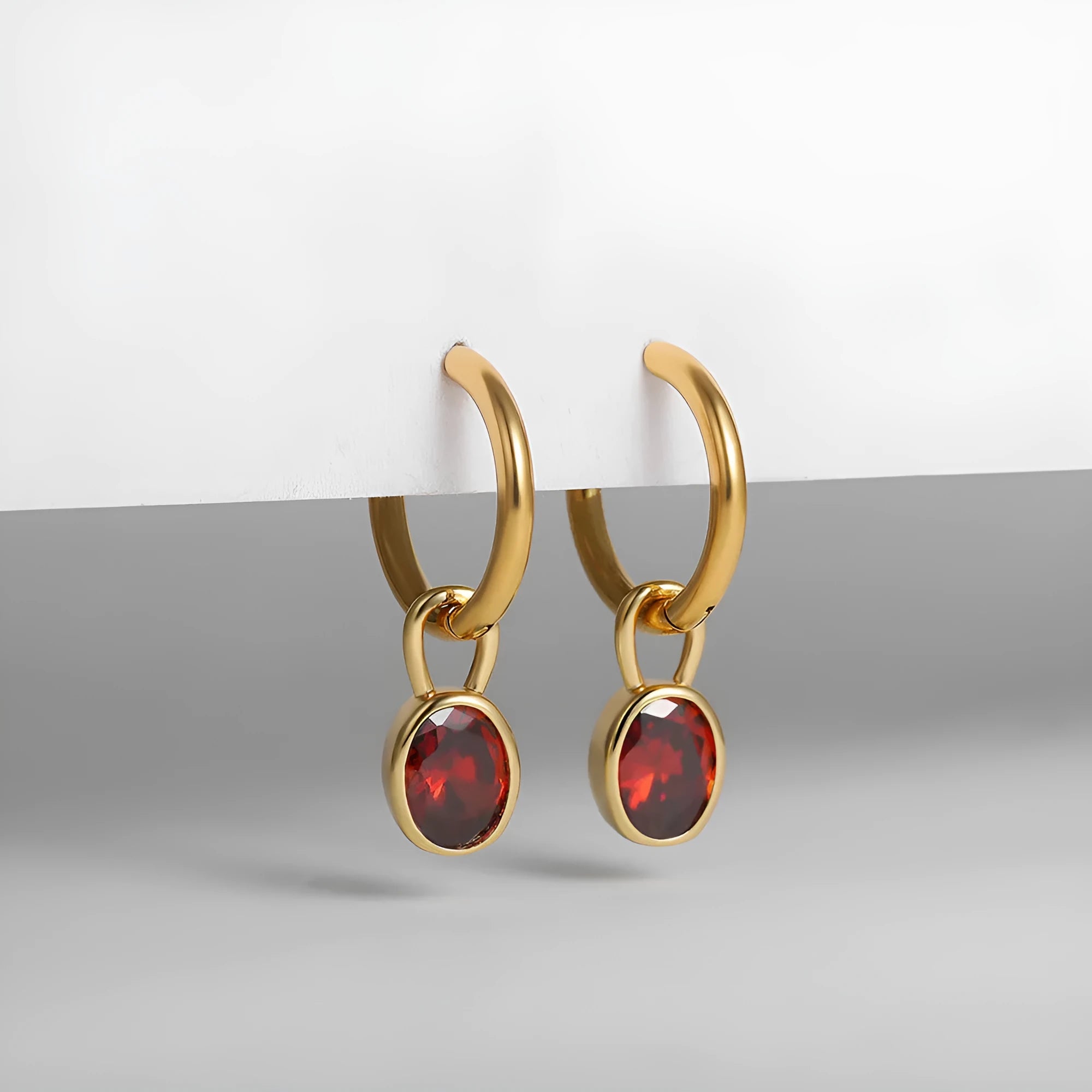 Retro oval zircon earrings for women in copper, shown in one of six colours: white, emerald, army green, black, red, or blue.