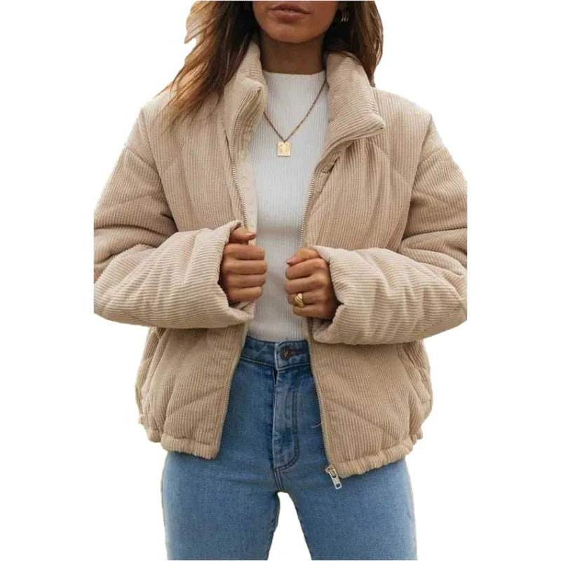 Women's apricot corduroy jacket with stand collar and front zipper on mannequin