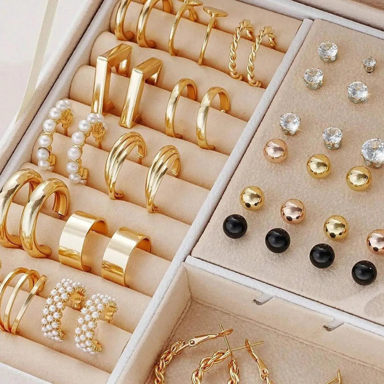 108 geometric alloy earrings with gold and yellow electroplated finishes and round pearl elements