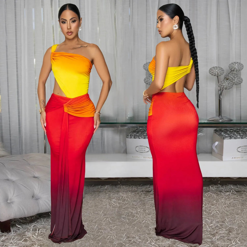 Women's sleeveless cross-shoulder dress in a gradient colour with a high waist and long skirt.