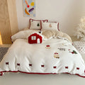 Winter Christmas cartoon bedding four-piece set with snowman design on polyester material