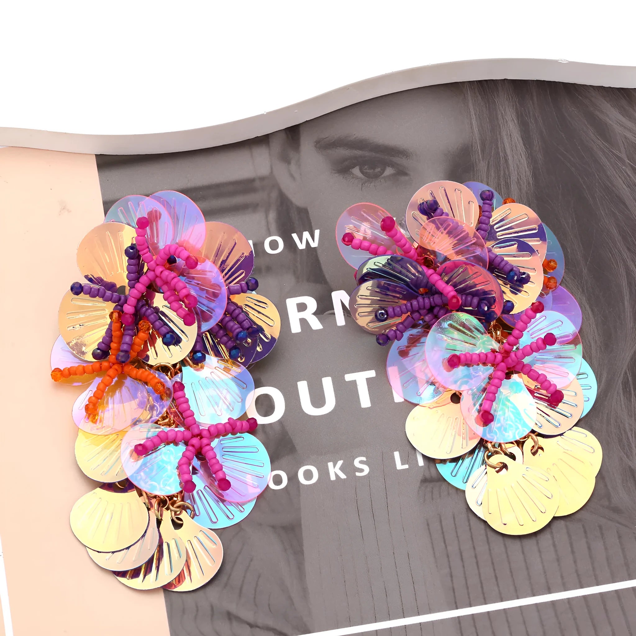 Handmade floral earrings with colourful beads on strings in exaggerated dopamine style European American design