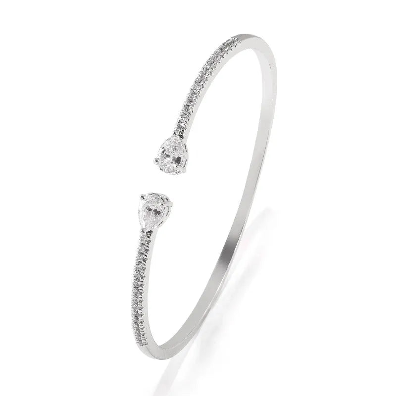 Multi-zircon personalised fashion bracelet with inlaid treatment on copper in blue and white options