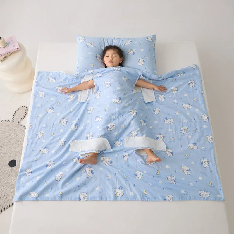 Anti-kick sleeping bag style blanket in a colourful pattern on a bed.