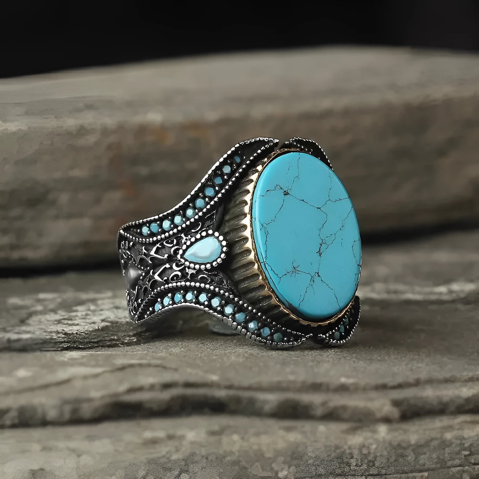 Men's turquoise round ring with antique silver finish shown in UK size 10