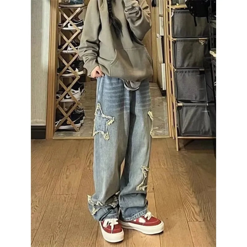 Blue high-waisted straight-leg women's jeans on a model, showing the front and side fit.
