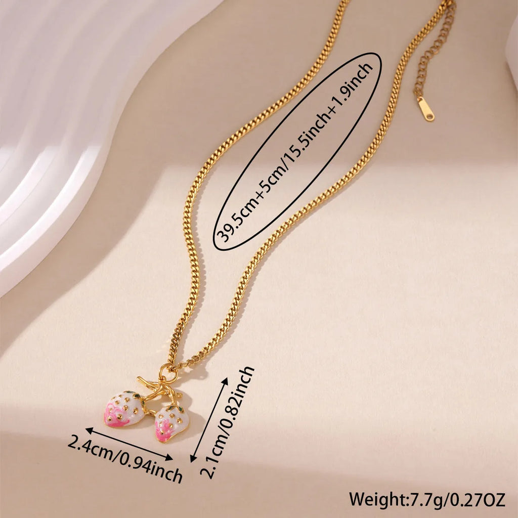 Women's summer strawberry fruit pendant necklace in red or white gradient on a steel chain.