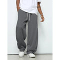 Men's casual straight leg polyester trousers with elastic drawstring waist in solid colours