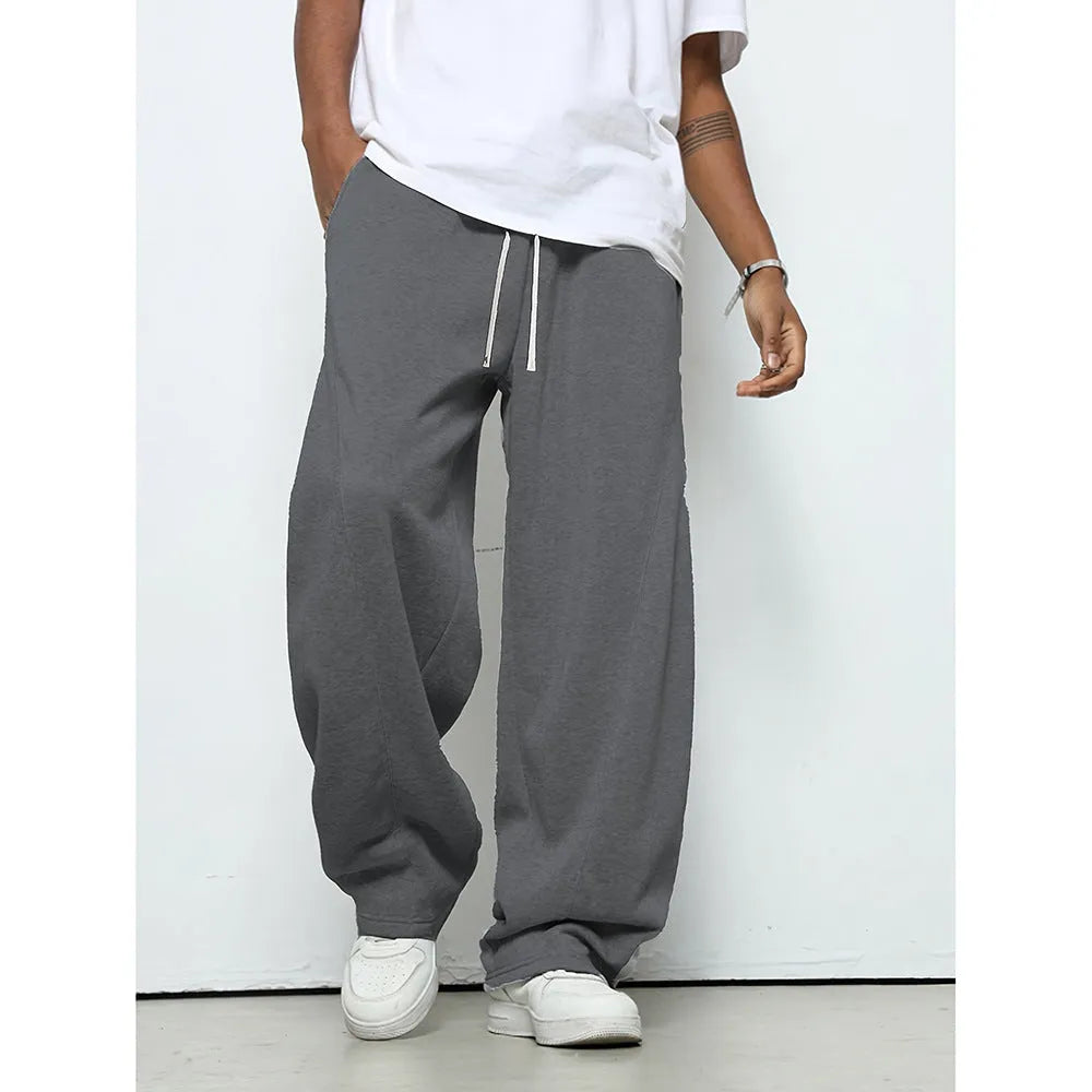 Men's casual straight leg polyester trousers with elastic drawstring waist in solid colours