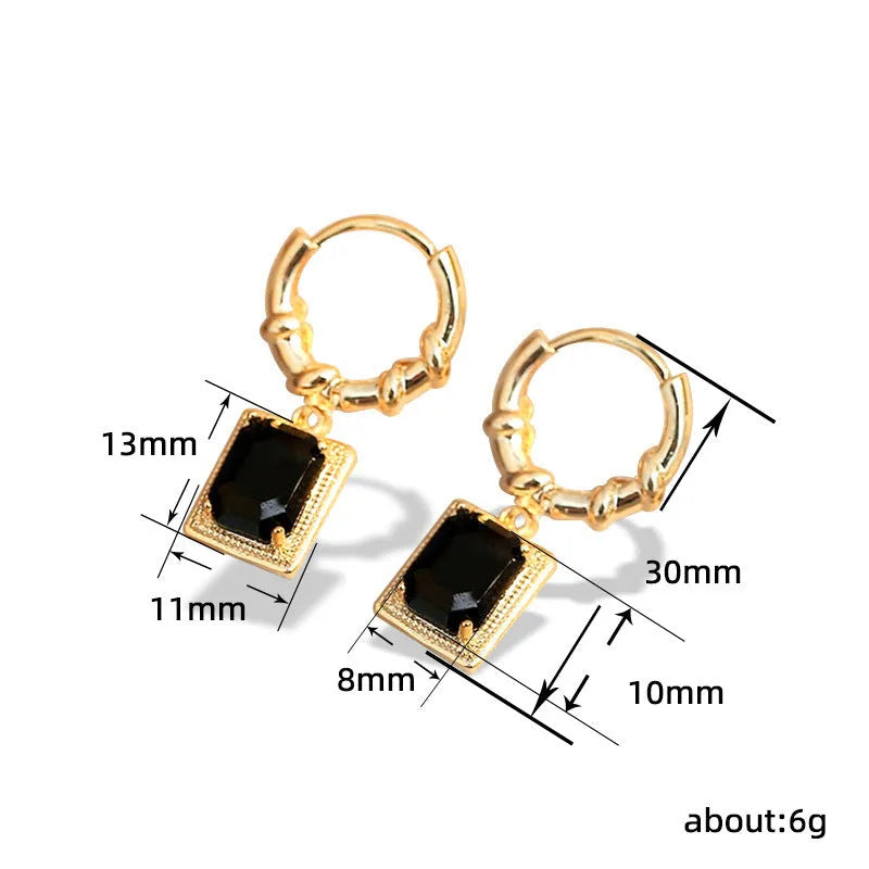A pair of geometric quadrilateral copper earrings with black zircon stones in a French court retro style, colour E2506 Black.