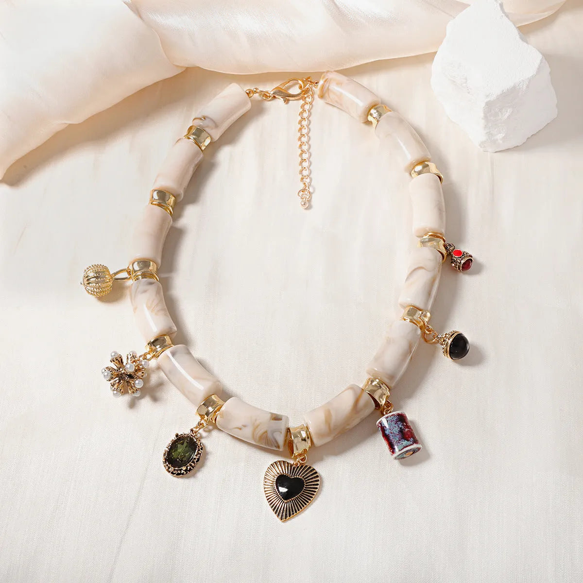 Heart shaped bamboo design resin necklace for women with electroplated picture colour finish
