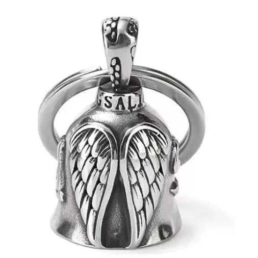 Vintage white angel feather alloy keychain and necklace on a dark background.