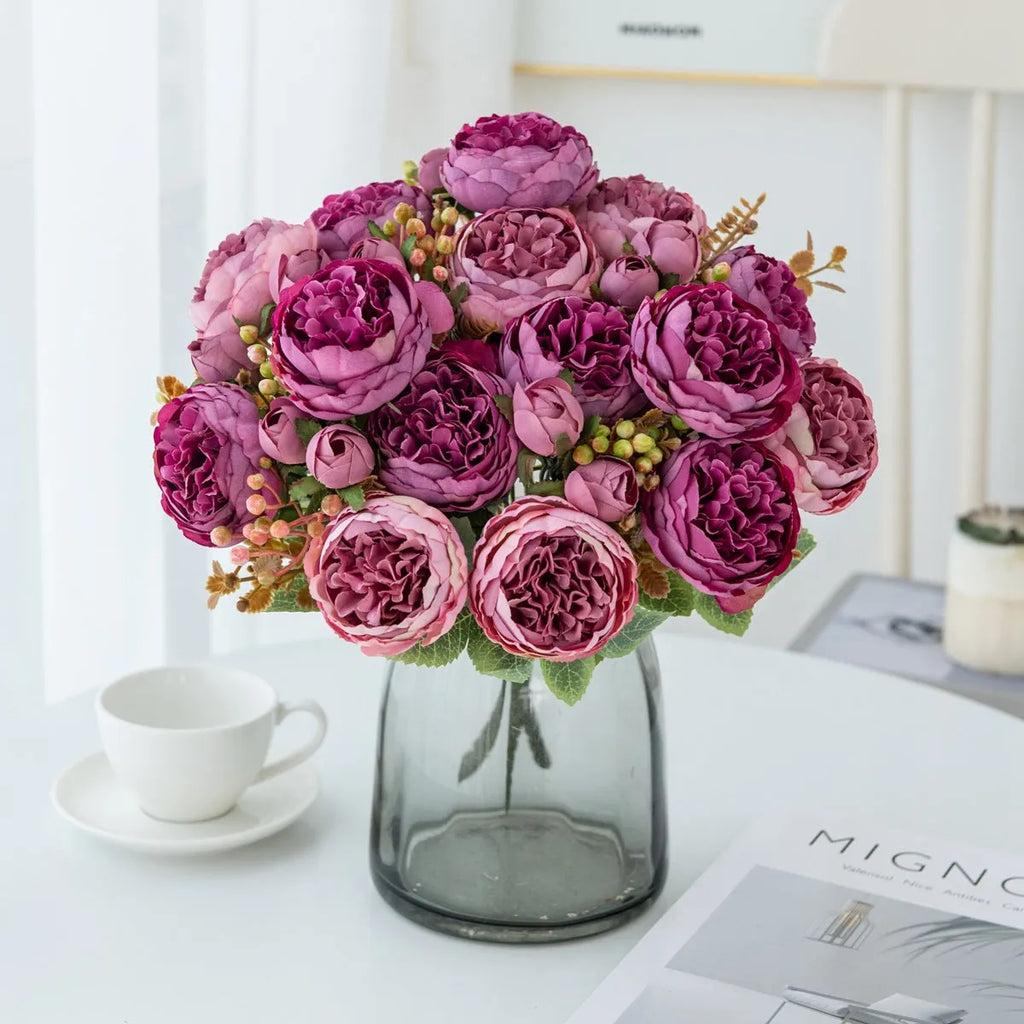 Silk artificial peony bouquet in champagne and sand red colours for home or wedding decoration.
