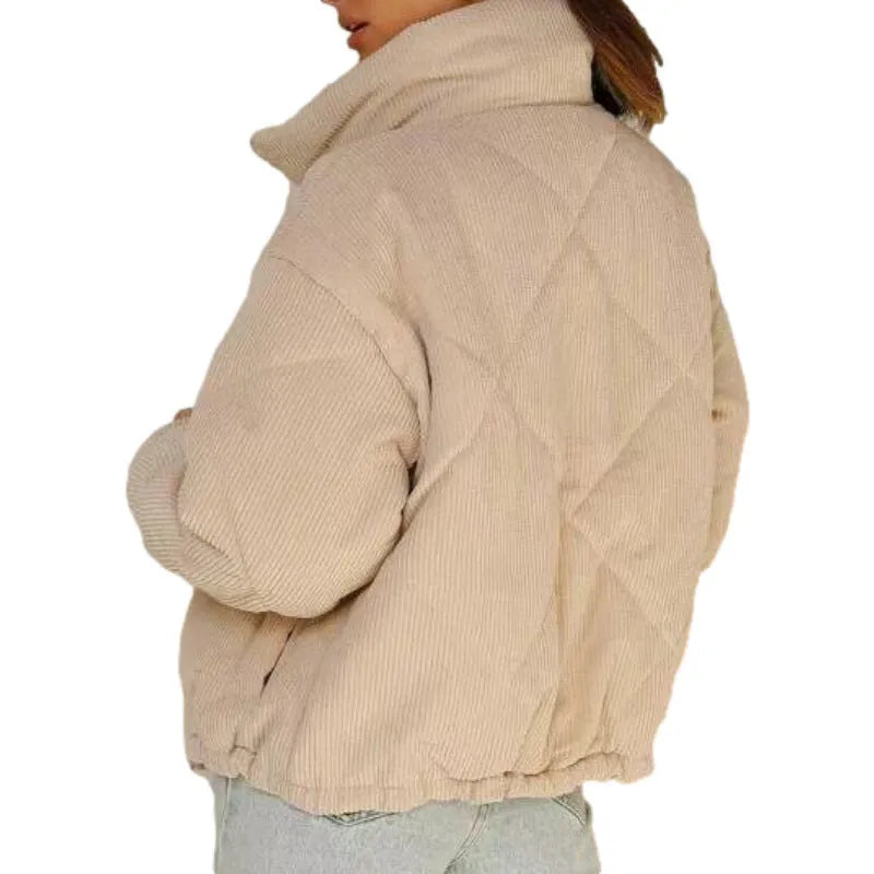 Women's apricot corduroy jacket with stand collar and front zipper on mannequin