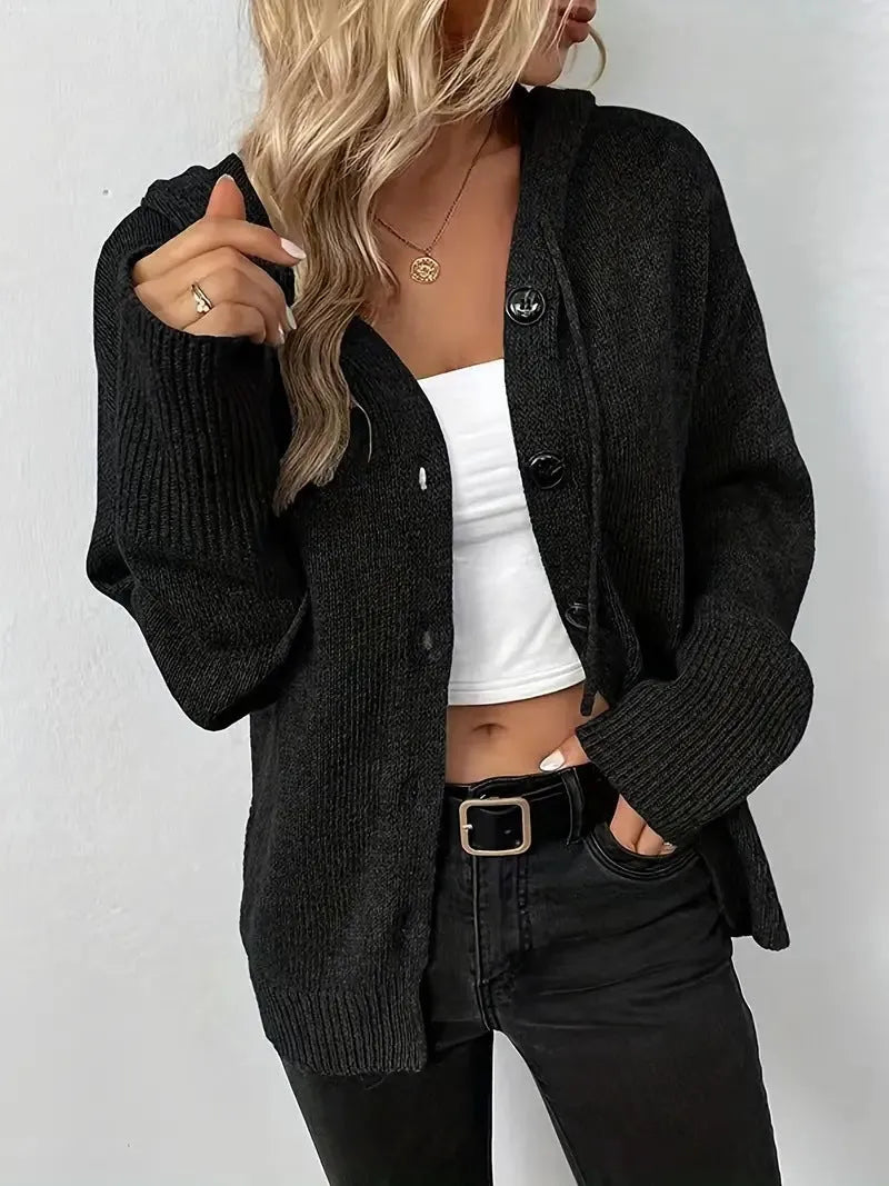 A thick grey hooded cotton cardigan with a raised 3D pattern, shown on a model.