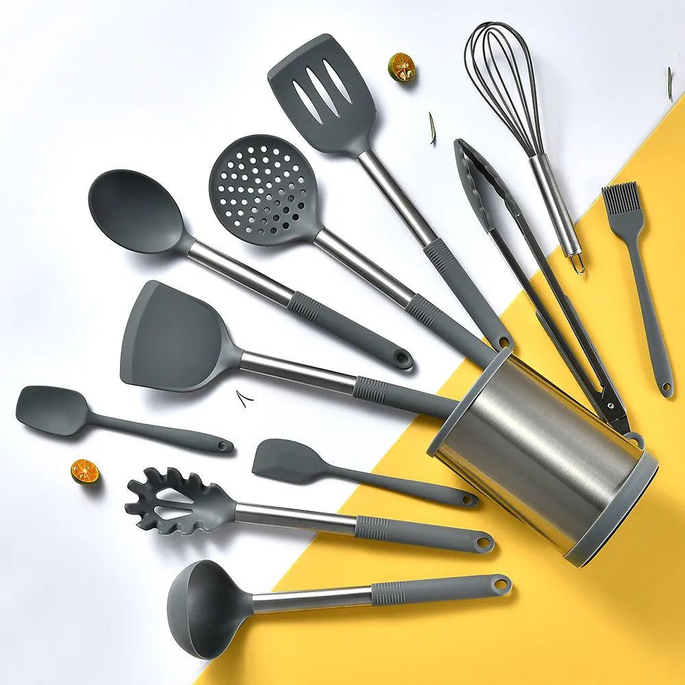 12-piece silicone kitchen utensil set in rotating storage bucket, showing spatula, ladle, and other tools.