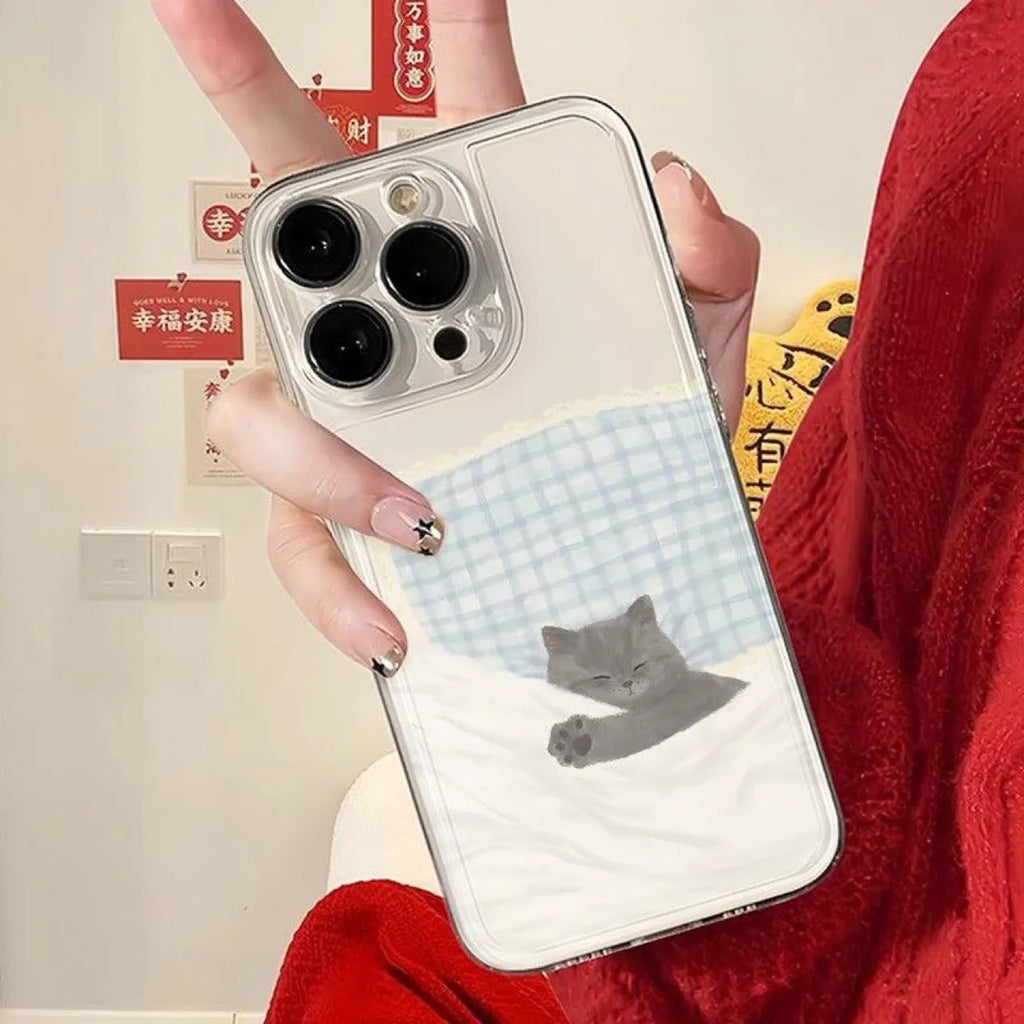 Transparent iPhone case with sleeping cat pattern showing shockproof TPU construction