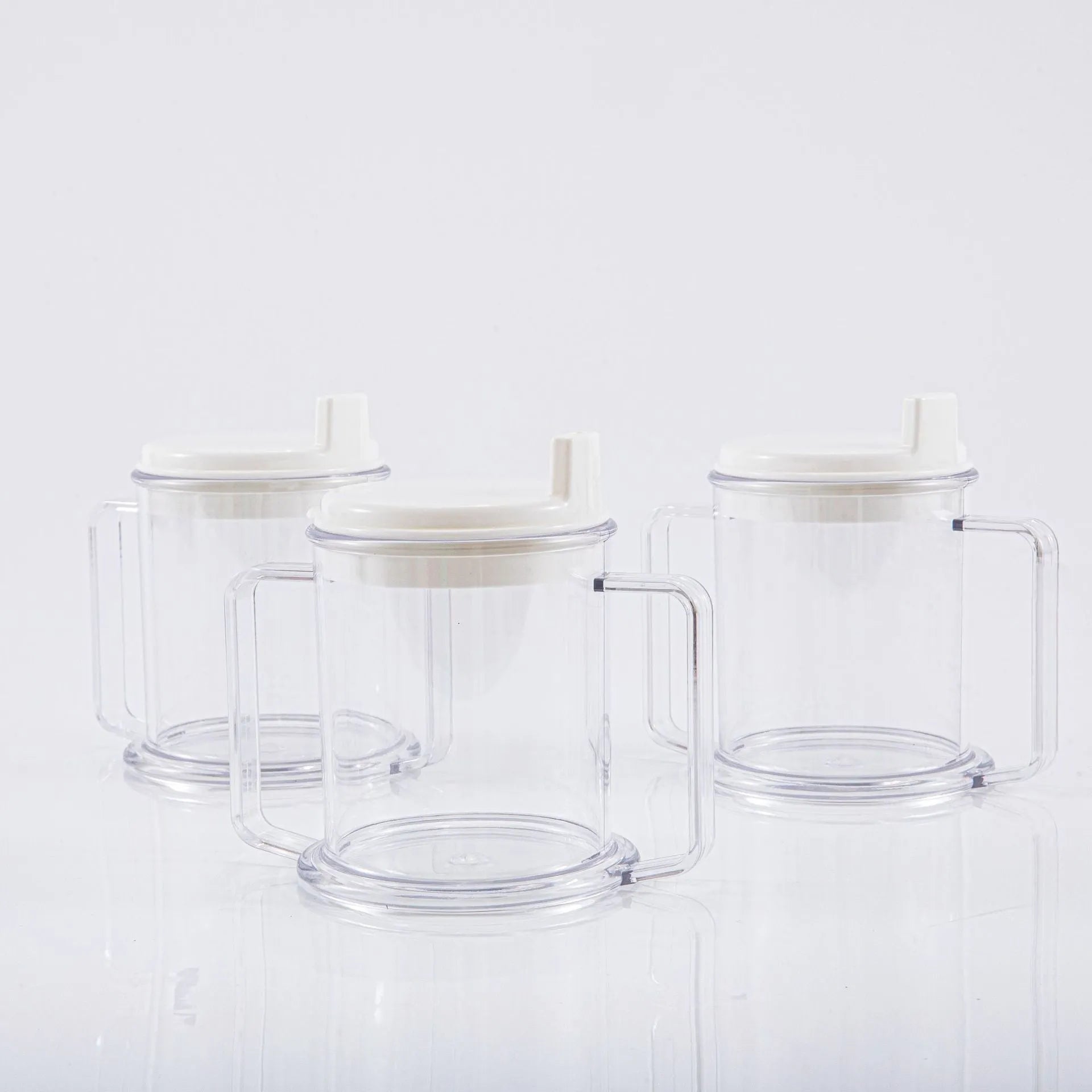 Transparent spill-proof drinking cup showing PP construction with modern simplicity design