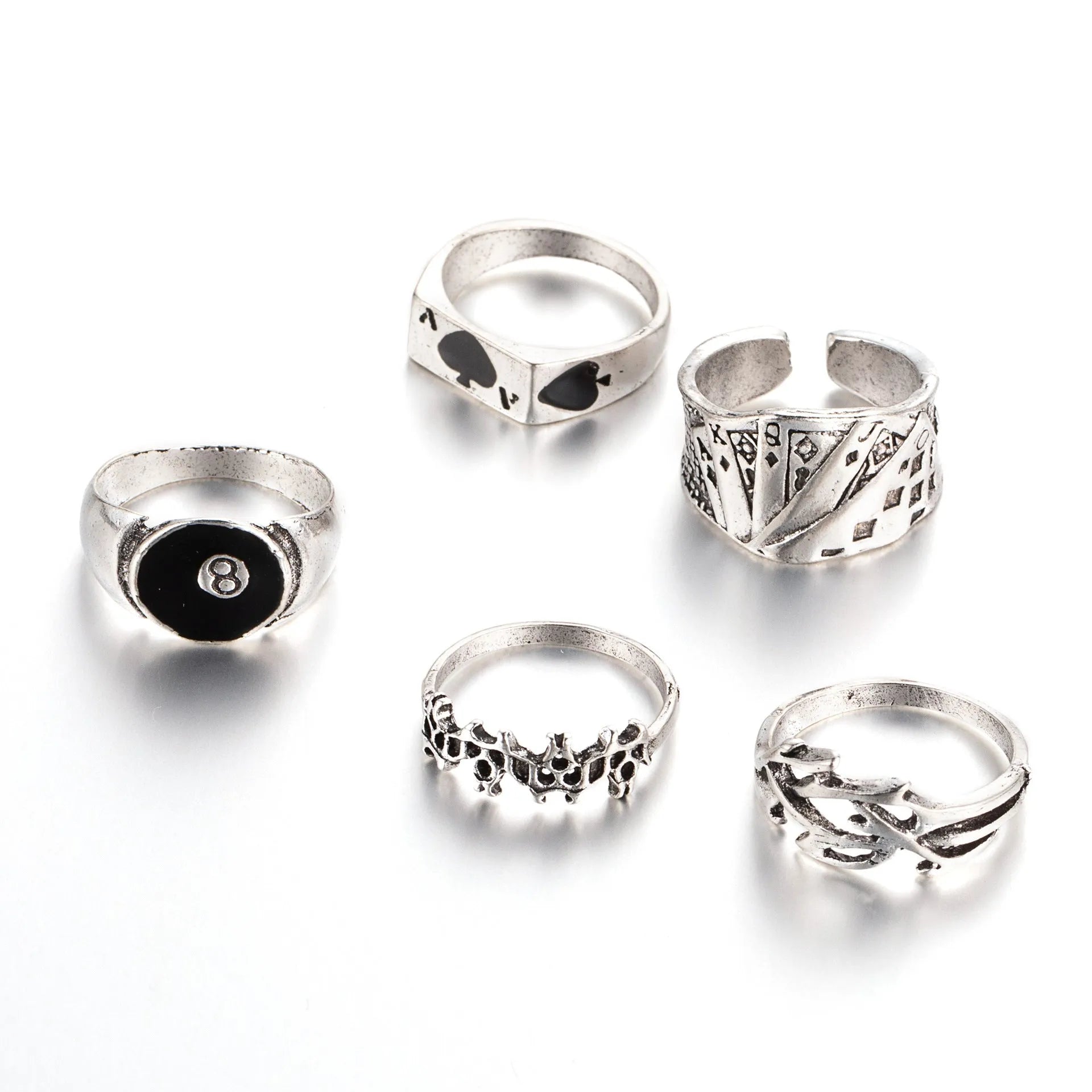 Black alloy ring with a raised spade card design on a band for women.