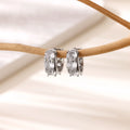 Women's U-shaped stainless steel ear clip earrings with inlaid zircon detailing in colour E5772P.